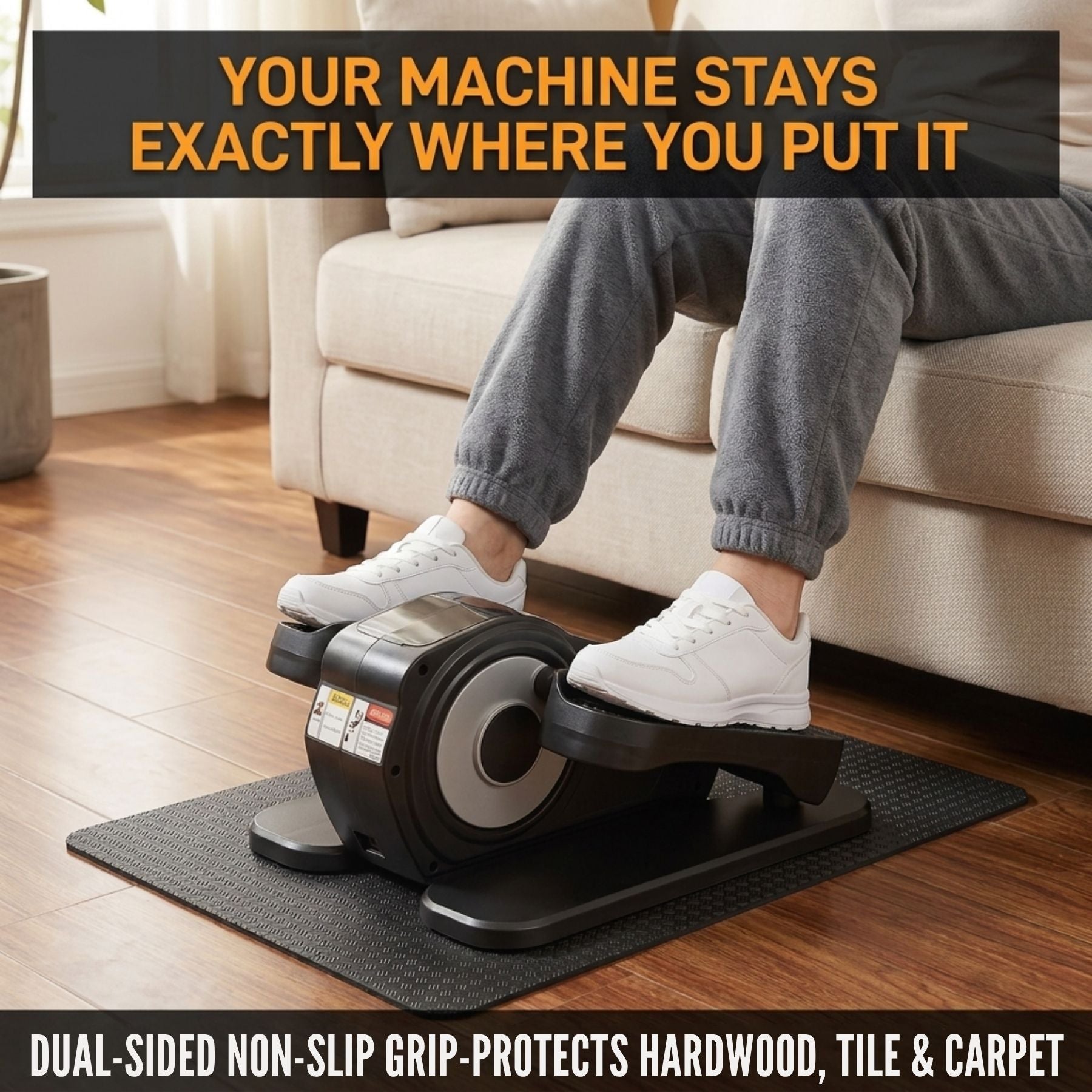 Senior woman using under-desk elliptical on non-slip mat over hardwood floor