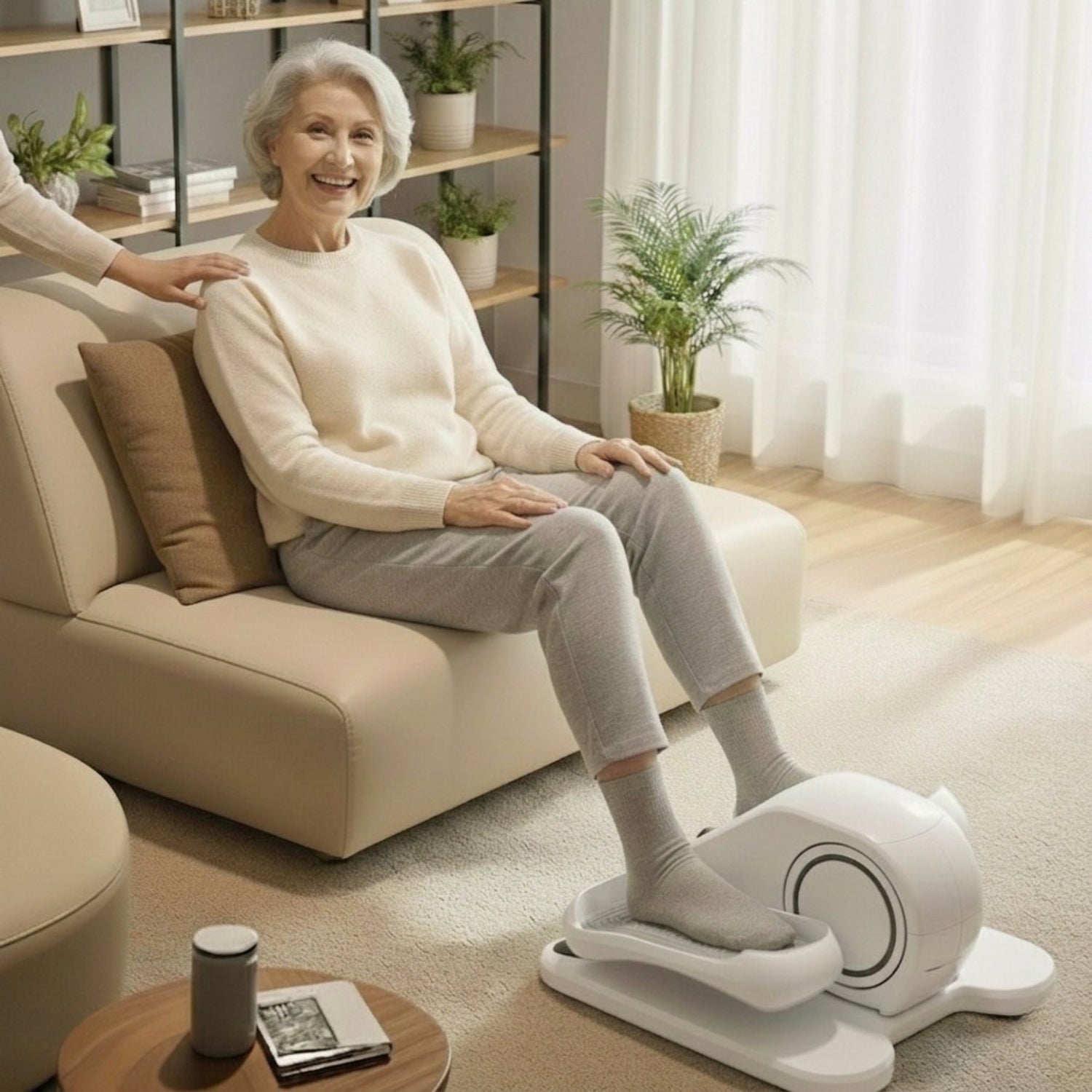 Elderly woman exercising with a seated pedal exerciser at home for leg circulation and fitness.